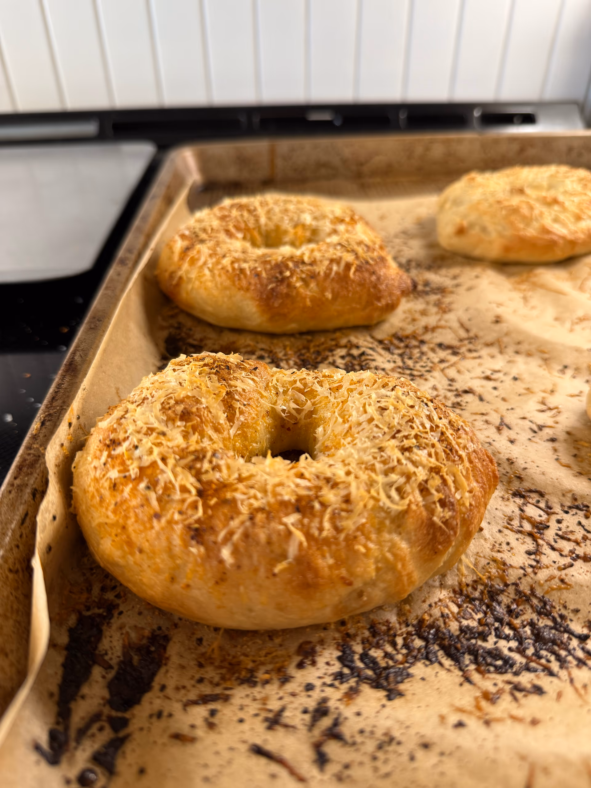 spiced baked bagels on a tray.