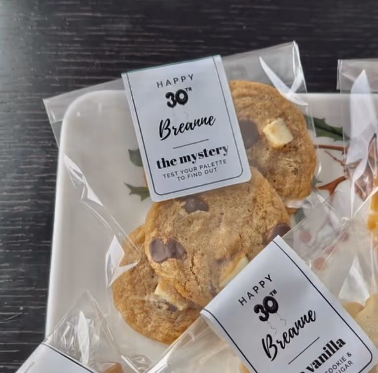 cookies in a bag that are dark chocolate, rosemary, and grana padano